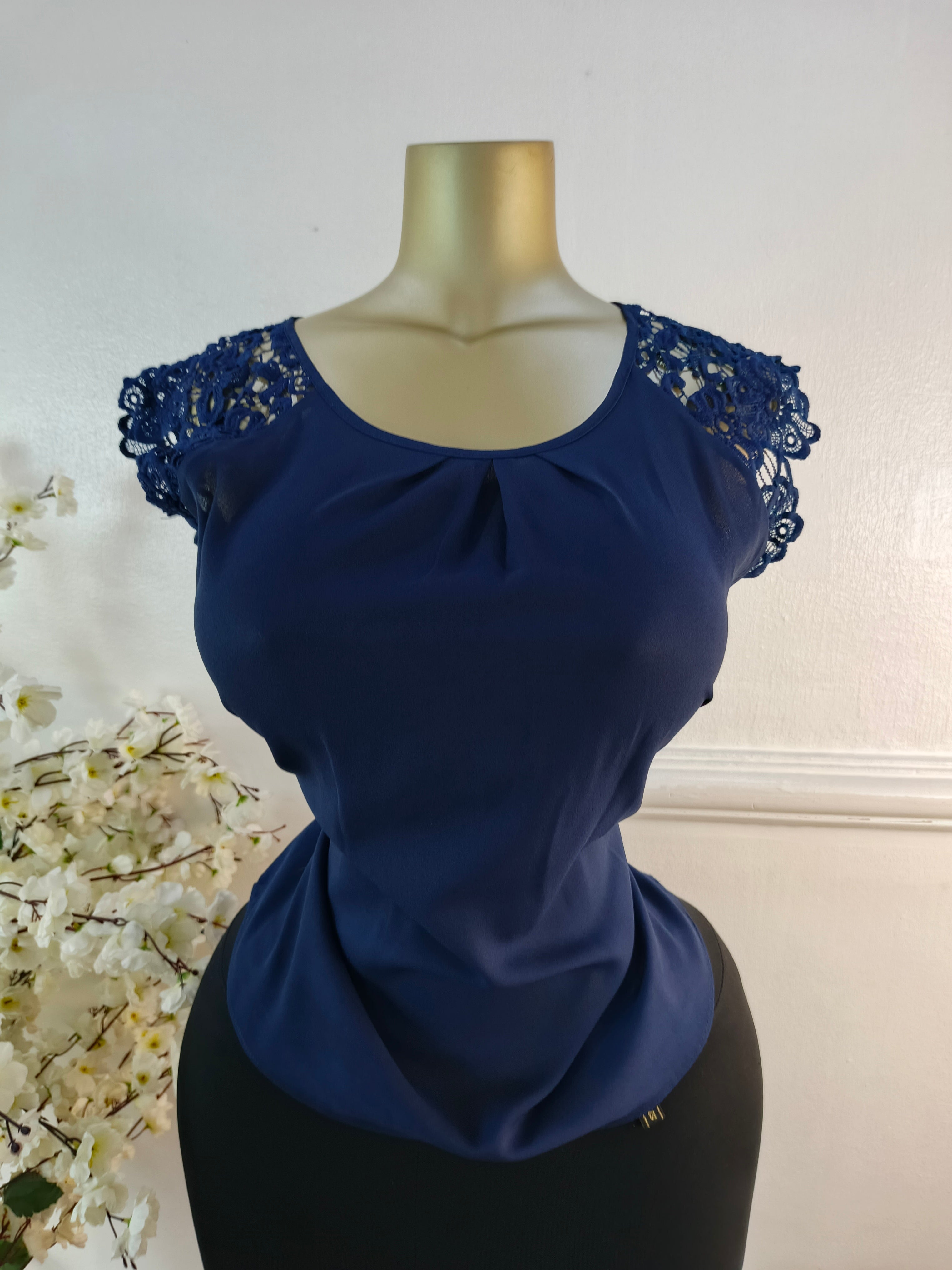 EXHIBIT UK SIZE 12